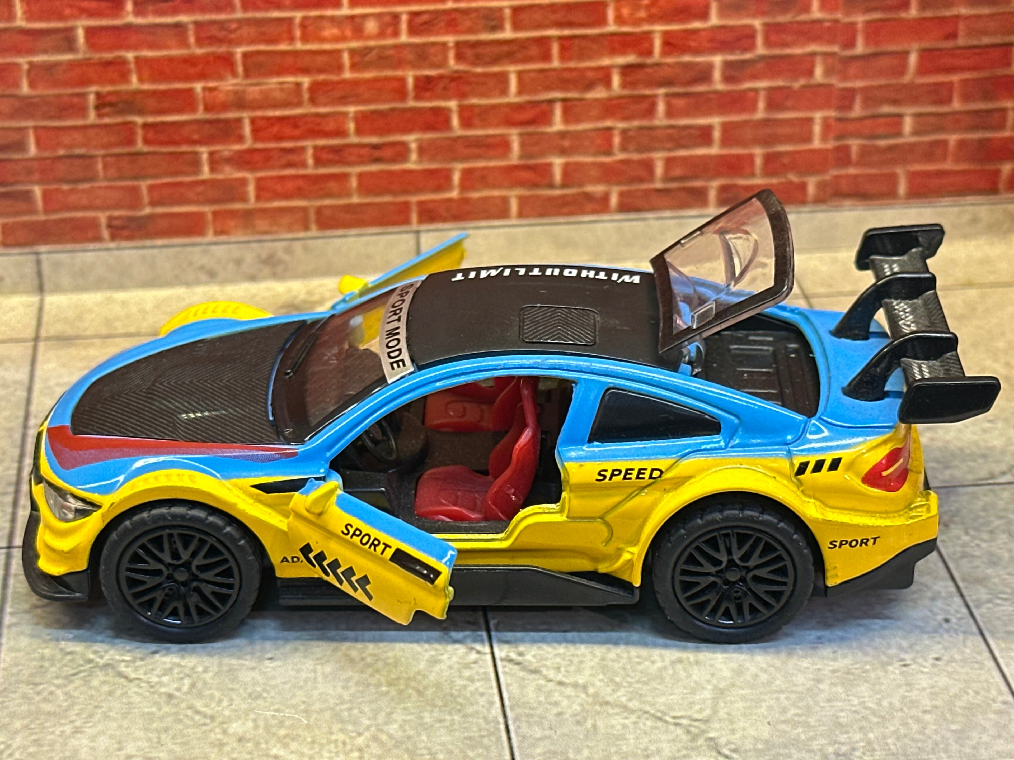 BMW M4 DTM (G82)1:36 Scale Yellow Blue